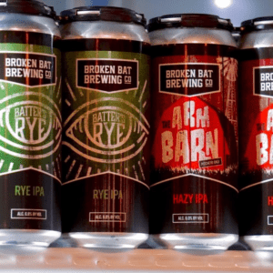 Two Broken Bat Brewing Company beers on a distribution shelf